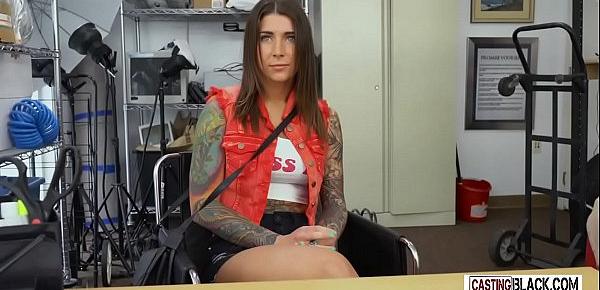  A petite tattooed teen is on her knees waiting to be fucked by a big black dick.